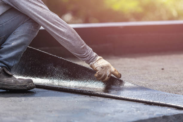 Professional Basement Waterproofing technician working in Christiansburg, VA
